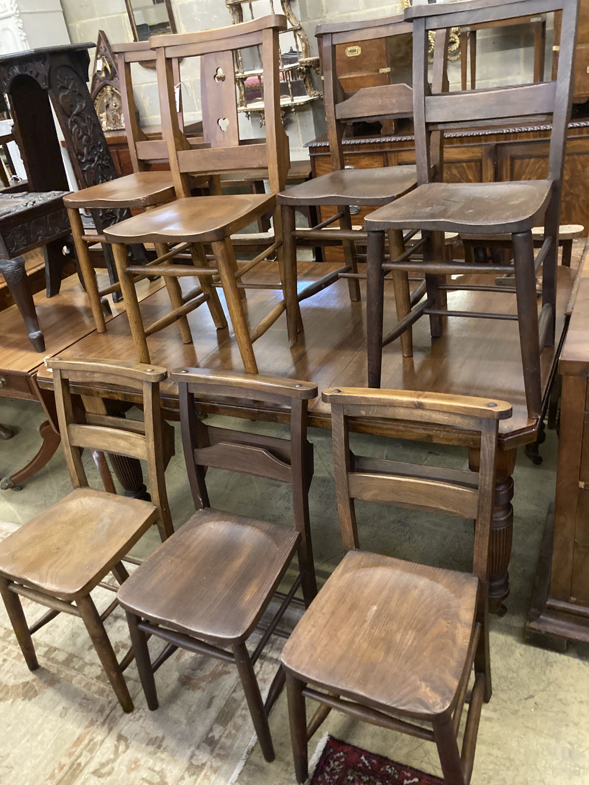 Seven Victorian elm and beech chapel chairs